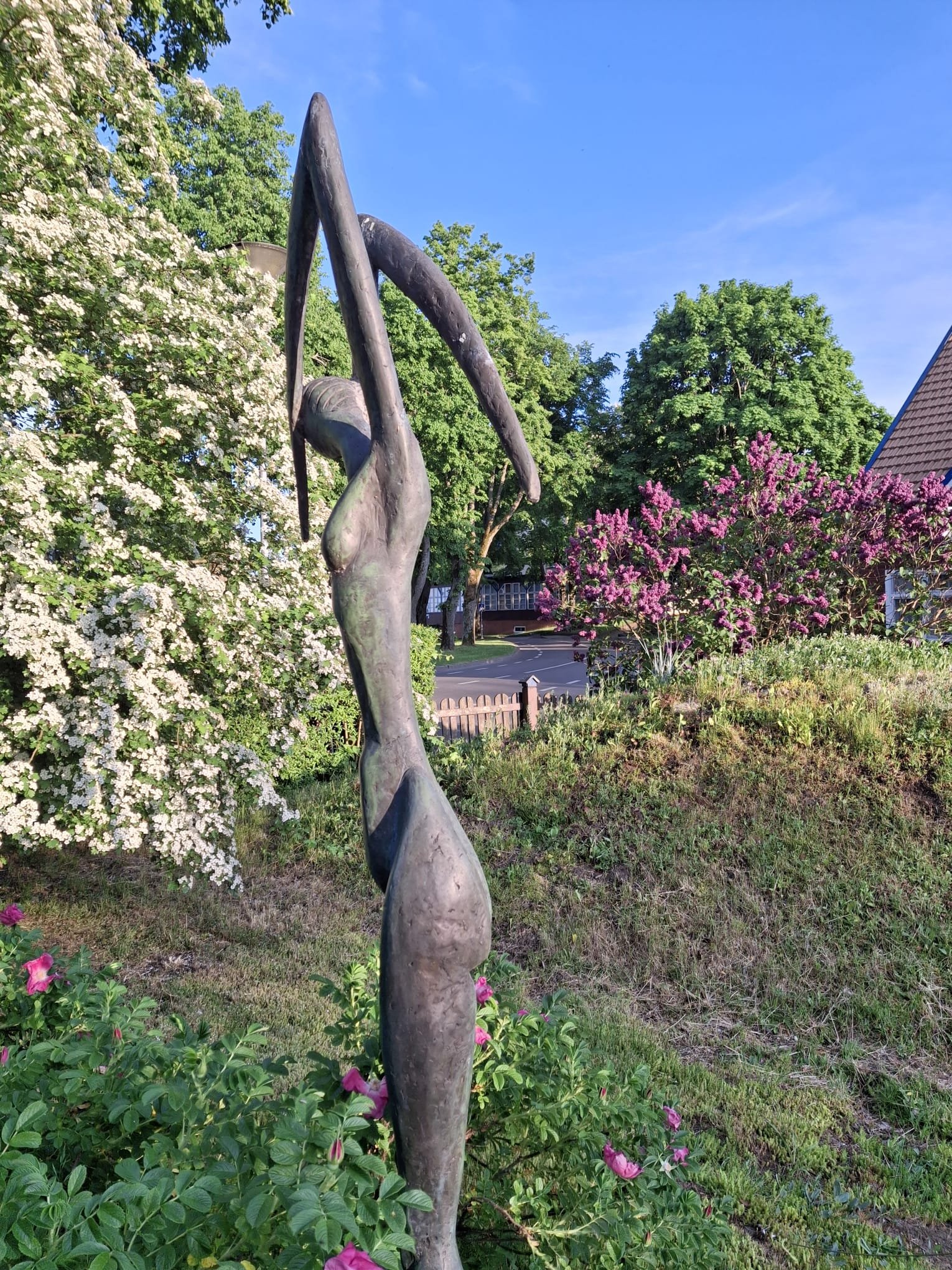 Sculpture and flowering garden at Aika