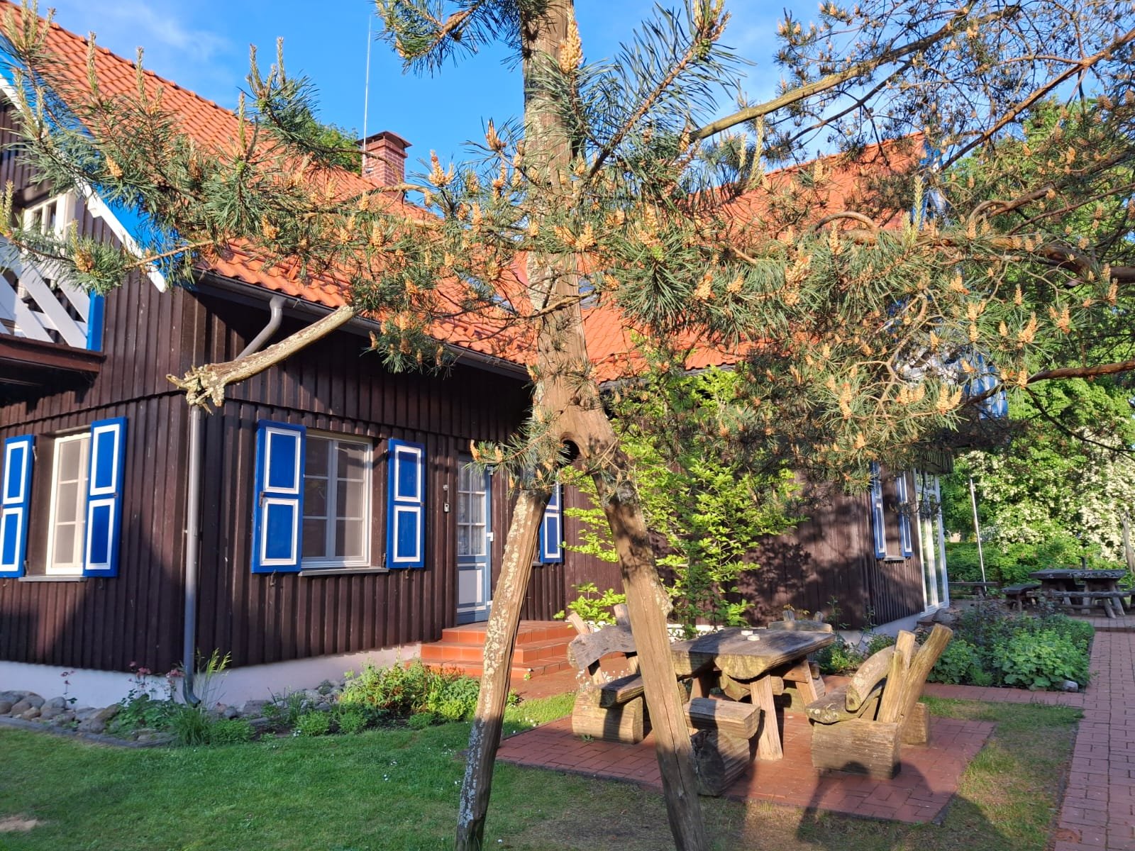 Aika Guest House with a garden and outdoor seating
